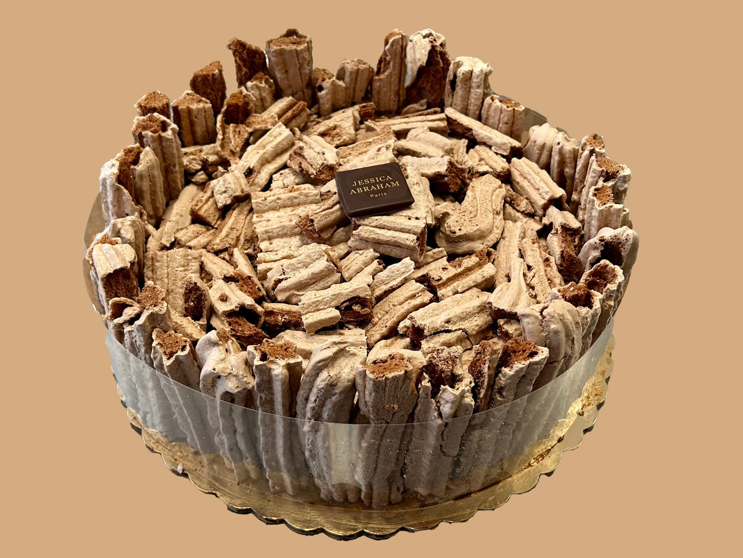 Chocolate meringue cake with 'jessica abraham' branding