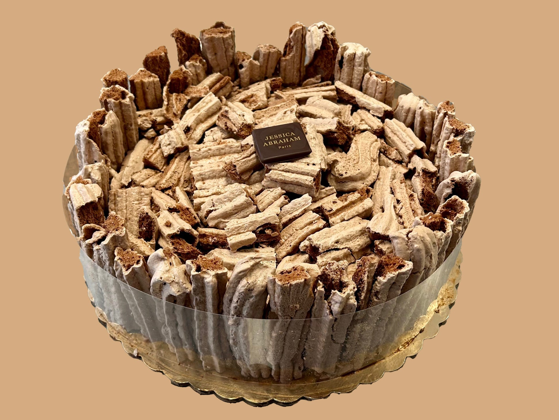 Chocolate meringue cake with 'jessica abraham' branding