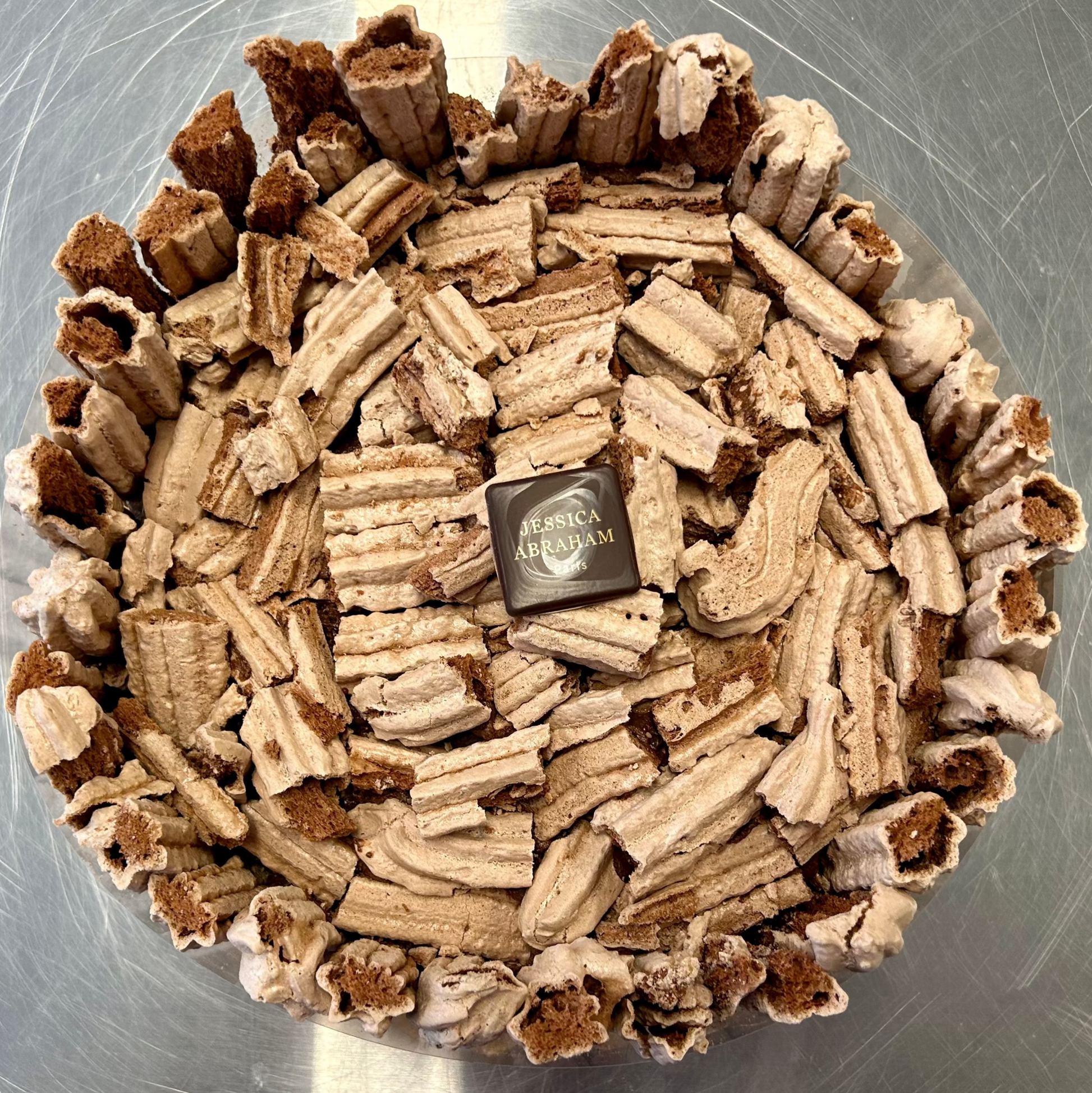 cocoa meringue mousse cake with 'jessica abraham' branding